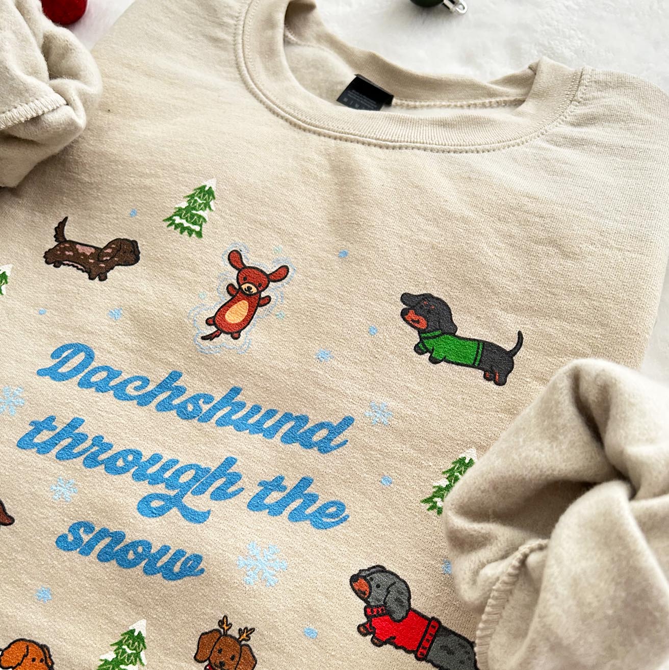 Dachshund Through the Snow Unisex Sweatshirt | Sand