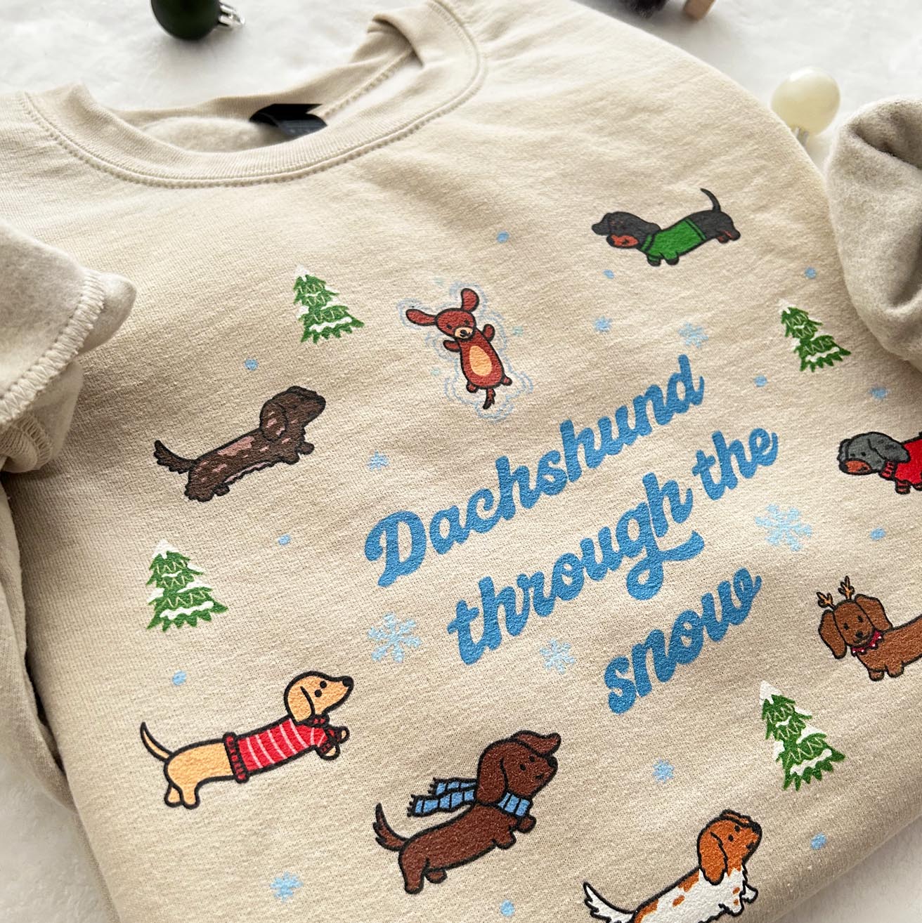 Dachshund Through the Snow Unisex Sweatshirt | Sand